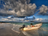 Beach and Boat  Beach scene south of ruins at Tulum