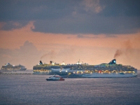 Cruise ships  Cruise ships cranking up for departure