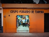 Night store front  Orange fronted store